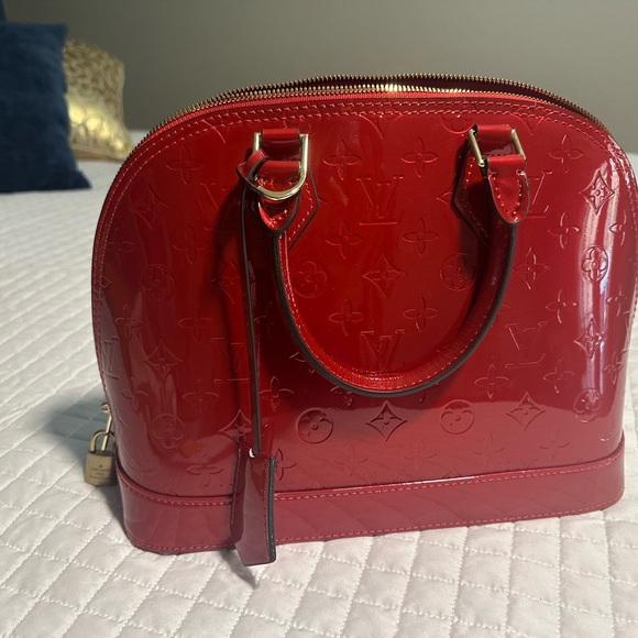 Beautiful red patent classic bag with beautiful brass hardware and details. - Picture 3 of 8